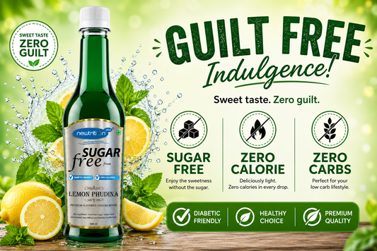 Bottle of sugar-free lemon phudina with lemon slices and mint leaves on a green background.