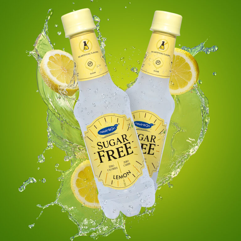 Two bottles of Pure Joy Sugar Free lemon sparkling drink arranged symmetrically with lemon slices and a green liquid splash background.